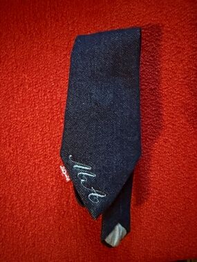 Unique Levi’s Navy blue denim tie with MA custom stitching.